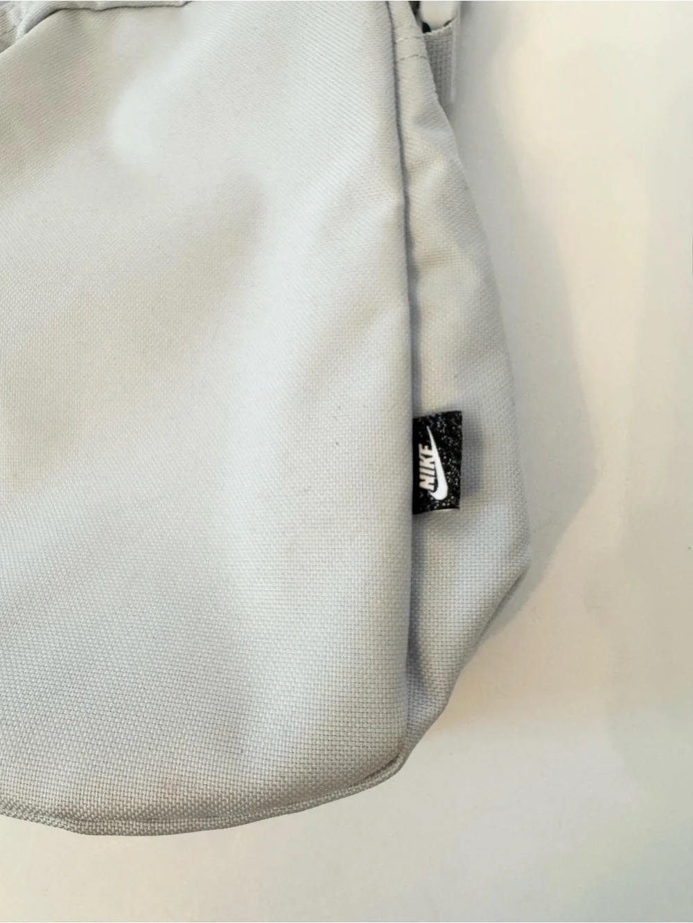 Nike Small Light Blue Crossbody Bag with Purple Logo